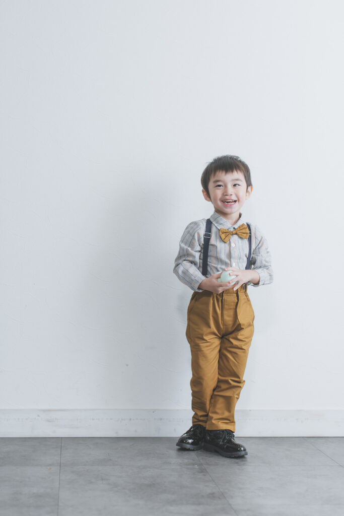 蝶ネクタイをつけた誕生日写真